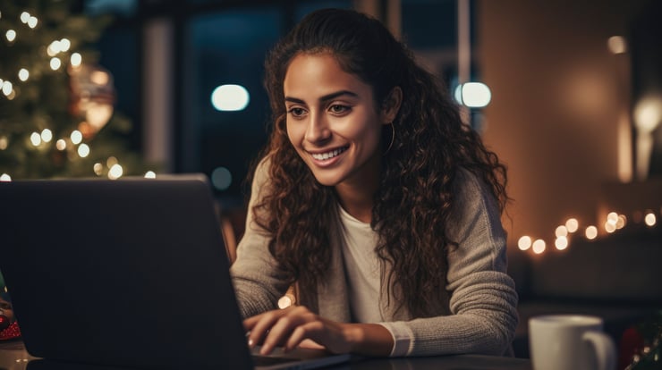 Woman looking at laptop